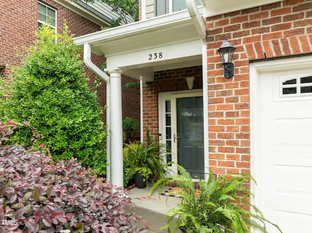 238 Langford Valley Way, Cary, NC 27513 - doorway to property featuring brick siding