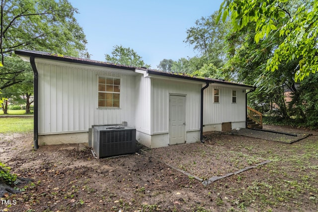 117 Bertie Dr, Raleigh, NC 27610 - rear view of property featuring central AC unit and entry steps