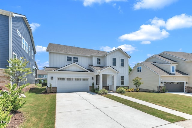 109 Crested Coral Dr, Holly Springs, NC 27540 - view of front of house with board and batten siding, driveway, a front lawn, and an attached garage