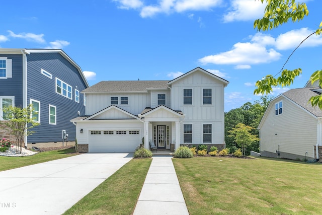 109 Crested Coral Dr, Holly Springs, NC 27540 - view of front of house featuring board and batten siding, a front yard, a garage, and concrete driveway