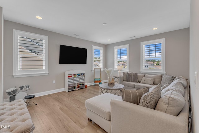 109 Crested Coral Dr, Holly Springs, NC 27540 - living area featuring light wood finished floors, recessed lighting, and baseboards