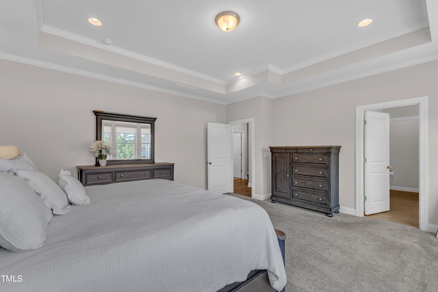 109 Crested Coral Dr, Holly Springs, NC 27540 - carpeted bedroom featuring a tray ceiling, ornamental molding, recessed lighting, and baseboards
