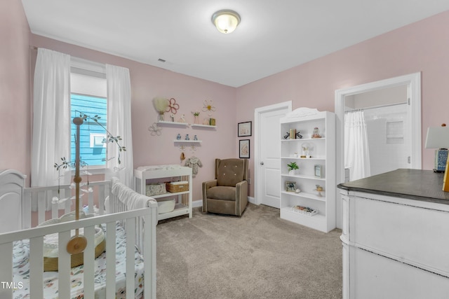 109 Crested Coral Dr, Holly Springs, NC 27540 - bedroom with light carpet and a crib