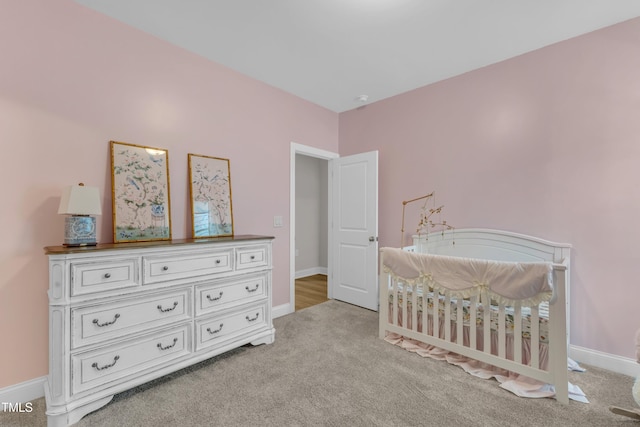 109 Crested Coral Dr, Holly Springs, NC 27540 - bedroom with light carpet and baseboards