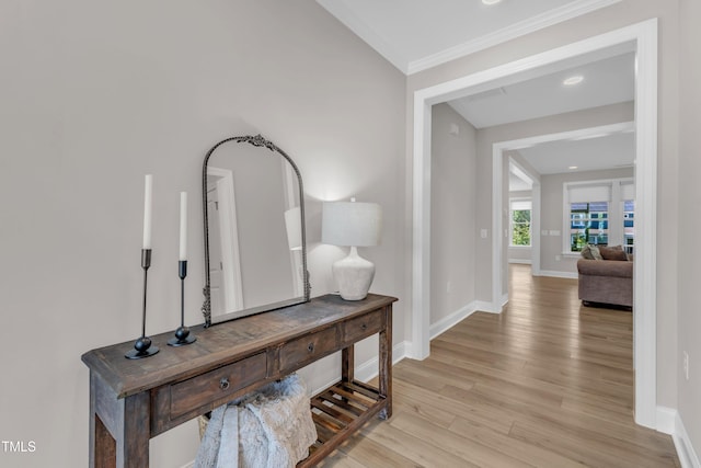 109 Crested Coral Dr, Holly Springs, NC 27540 - hallway featuring baseboards, light wood-style flooring, and crown molding