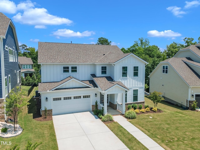109 Crested Coral Dr, Holly Springs, NC 27540 - view of front of property featuring board and batten siding, driveway, an attached garage, a front yard, and a shingled roof