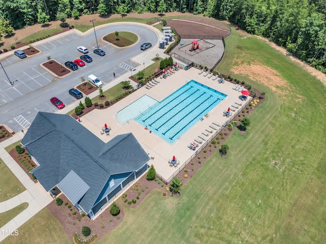 109 Crested Coral Dr, Holly Springs, NC 27540 - drone / aerial view of a pool area