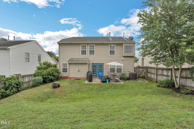 6 Newgate Ct, Durham, NC 27713 - back of house with a fire pit, a patio area, and central AC