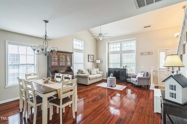 6 Newgate Ct, Durham, NC 27713 - dining space with a chandelier, dark wood-style floors, baseboards, ceiling fan, and high vaulted ceiling
