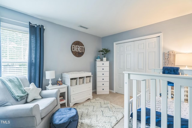 6 Newgate Ct, Durham, NC 27713 - bedroom featuring light colored carpet and a closet