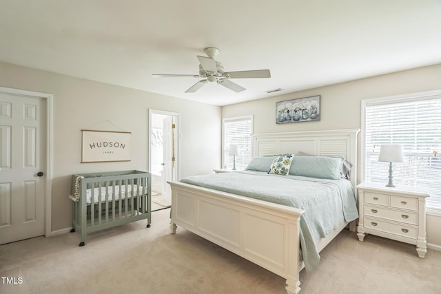 6 Newgate Ct, Durham, NC 27713 - bedroom with light carpet, baseboards, and a ceiling fan
