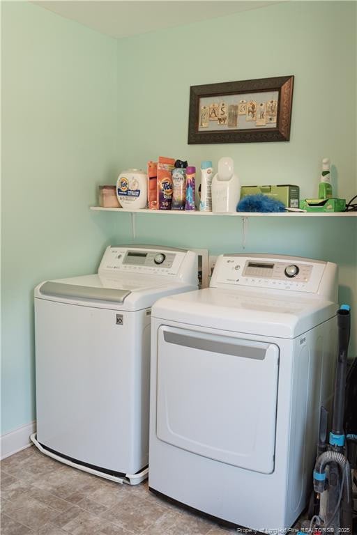 101 Birdsong Ct, Aberdeen, NC 28315 - laundry room with washing machine and clothes dryer and baseboards