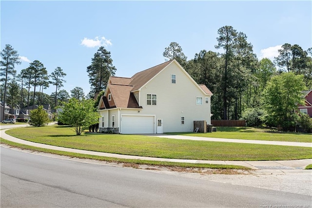 101 Birdsong Ct, Aberdeen, NC 28315 - view of side of home with a garage, a yard, and driveway