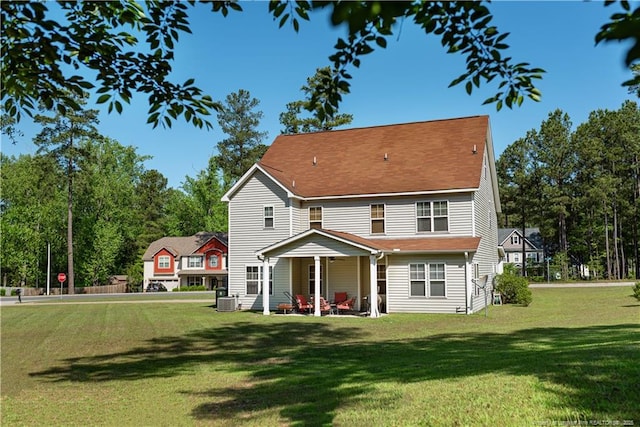 101 Birdsong Ct, Aberdeen, NC 28315 - rear view of property with a yard, a patio area, and central AC