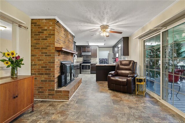 2547 Red Springs Rd, Raeford, NC 28376 - living room with a ceiling fan, stone finish flooring, a textured ceiling, and a fireplace
