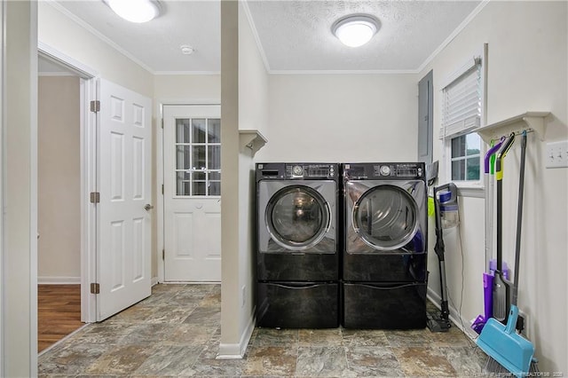 2547 Red Springs Rd, Raeford, NC 28376 - washroom featuring washing machine and dryer, stone finish floors, a textured ceiling, baseboards, and crown molding