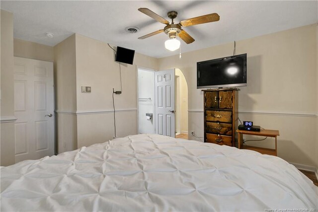 2547 Red Springs Rd, Raeford, NC 28376 - bedroom featuring baseboards, a ceiling fan, and arched walkways