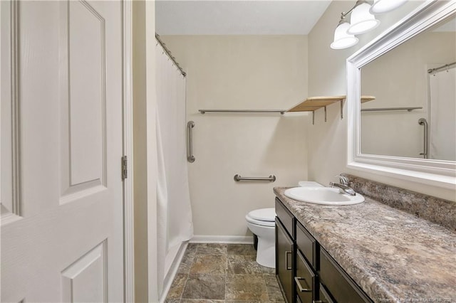 2547 Red Springs Rd, Raeford, NC 28376 - full bath featuring vanity, baseboards, toilet, curtained shower, and stone finish floors