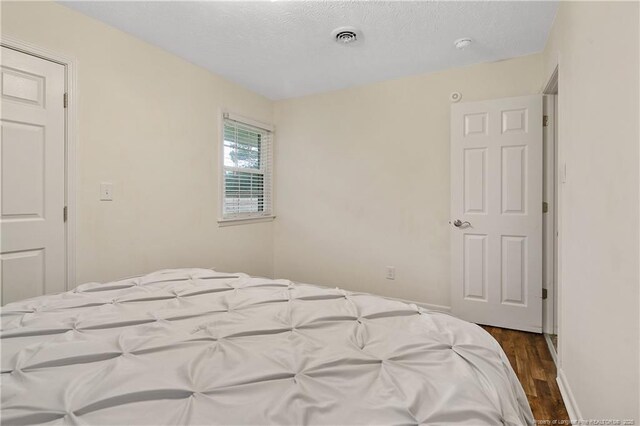 2547 Red Springs Rd, Raeford, NC 28376 - bedroom with wood finished floors and baseboards