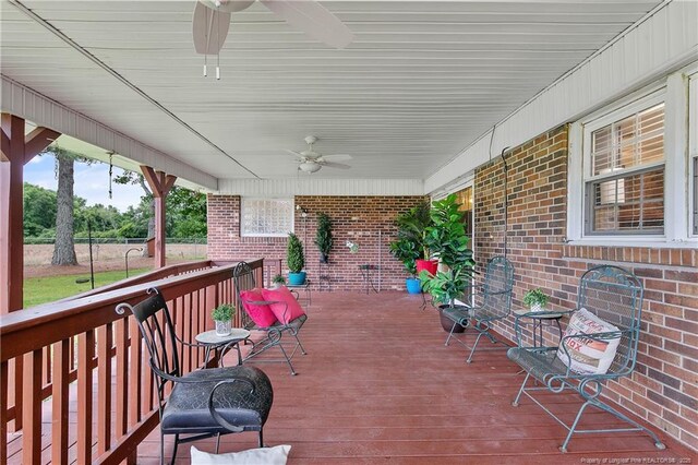 2547 Red Springs Rd, Raeford, NC 28376 - wooden porch with a ceiling fan