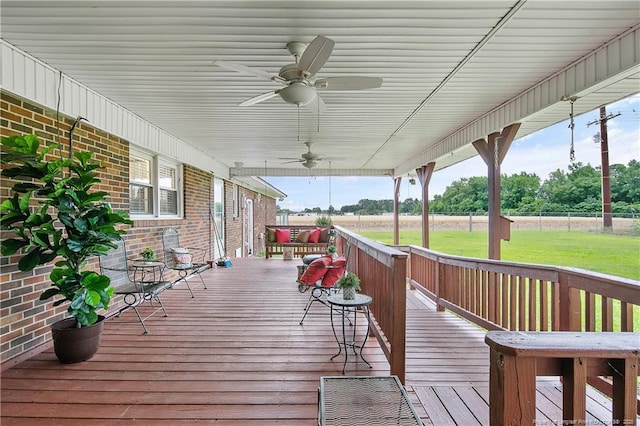 2547 Red Springs Rd, Raeford, NC 28376 - wooden deck featuring ceiling fan and a lawn