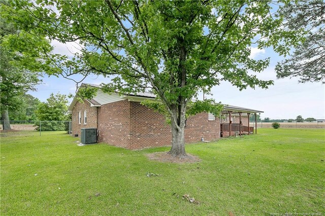 2547 Red Springs Rd, Raeford, NC 28376 - view of property exterior featuring central air condition unit and brick siding