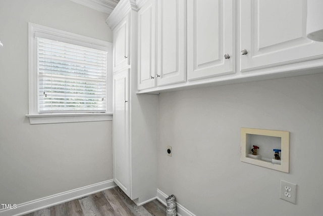 3020 Woods Walk Way, Rocky Mount, NC 27804 - washroom with electric dryer hookup, hookup for a washing machine, cabinet space, wood finished floors, and baseboards