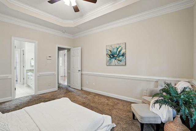 3020 Woods Walk Way, Rocky Mount, NC 27804 - bedroom featuring carpet flooring, crown molding, a tray ceiling, a ceiling fan, and connected bathroom