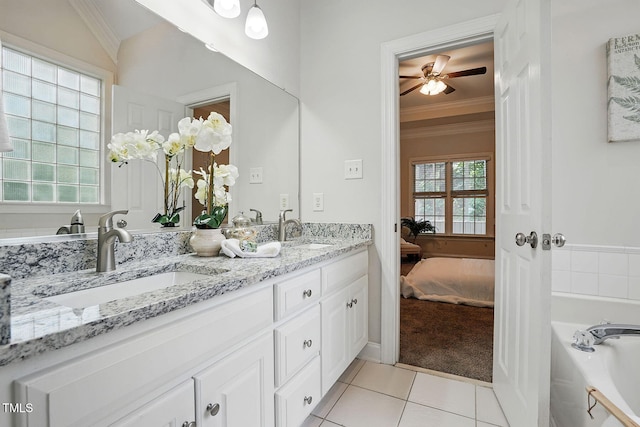 3020 Woods Walk Way, Rocky Mount, NC 27804 - ensuite bathroom featuring ornamental molding, double vanity, tile patterned flooring, a bath, and a ceiling fan