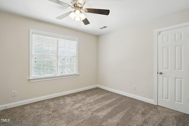 3020 Woods Walk Way, Rocky Mount, NC 27804 - empty room with carpet flooring, ceiling fan, and baseboards