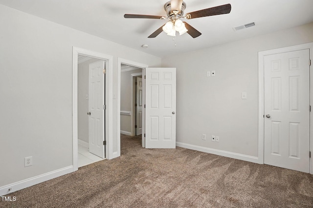 3020 Woods Walk Way, Rocky Mount, NC 27804 - unfurnished bedroom featuring carpet, baseboards, and ceiling fan