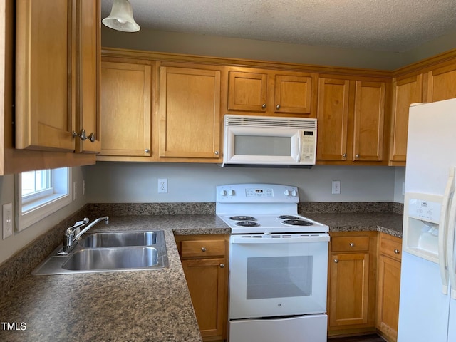 78 Ariel St, Lillington, NC 27546 - kitchen with white appliances, a sink, and brown cabinetry