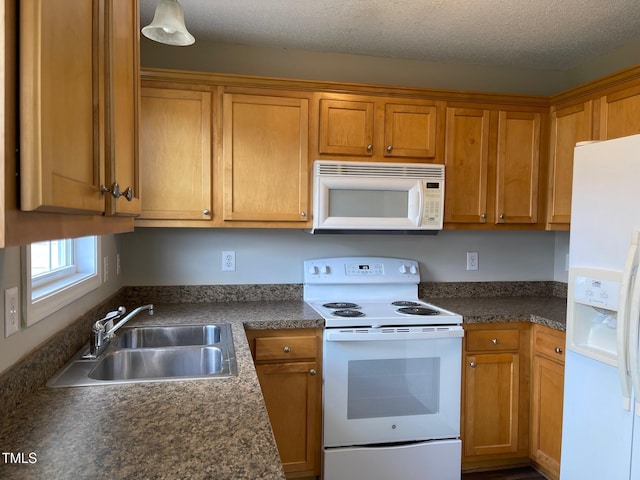 78 Ariel St, Lillington, NC 27546 - kitchen featuring white appliances, a sink, dark countertops, and brown cabinets