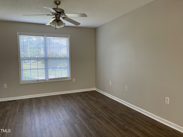 78 Ariel St, Lillington, NC 27546 - unfurnished room with a ceiling fan, dark wood-type flooring, a textured ceiling, and baseboards