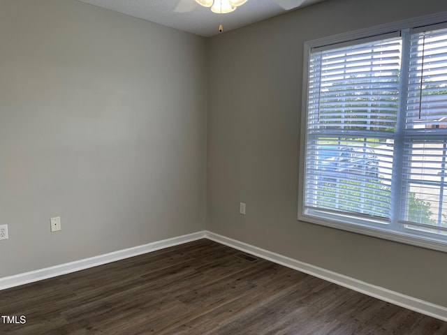 78 Ariel St, Lillington, NC 27546 - unfurnished room featuring plenty of natural light, dark wood-style floors, a ceiling fan, and baseboards