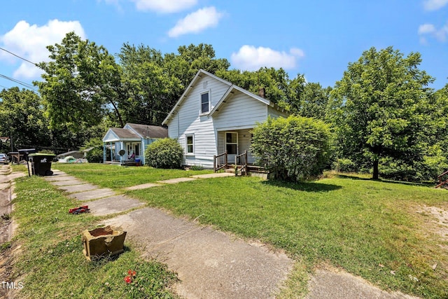 312 W Front St, Oxford, NC 27565 - view of front facade featuring a front lawn