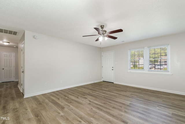 1110 Allgood St, Durham, NC 27704 - unfurnished room featuring wood finished floors, ceiling fan, baseboards, and a smoke detector