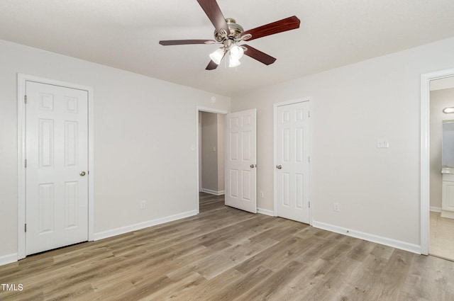 1110 Allgood St, Durham, NC 27704 - unfurnished bedroom with light wood-style floors, connected bathroom, baseboards, and ceiling fan