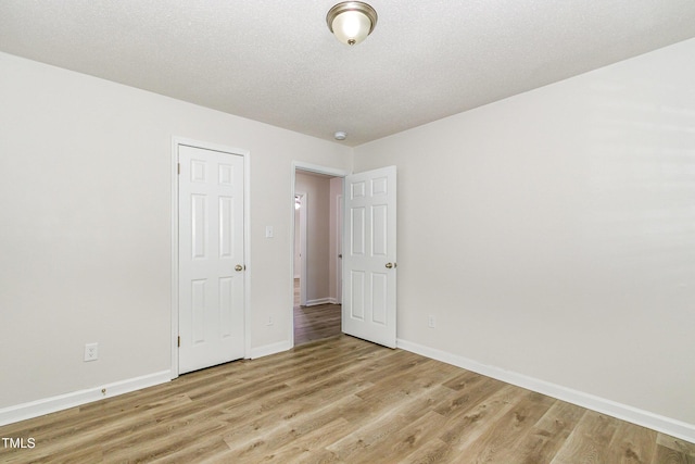 1110 Allgood St, Durham, NC 27704 - unfurnished room with light wood-type flooring and baseboards