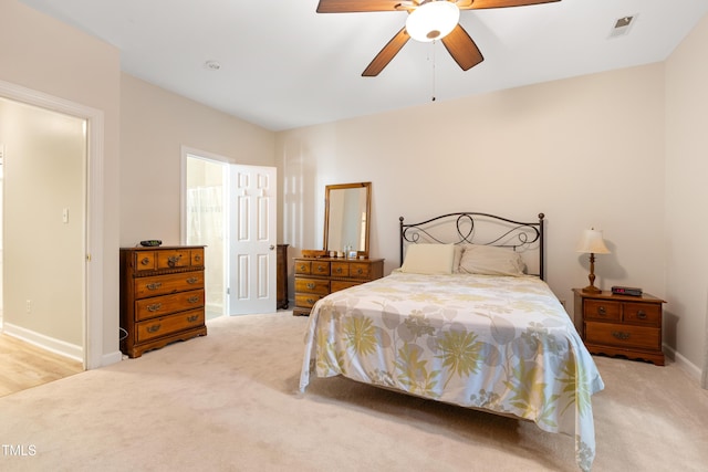 119 Danforth Dr, Cary, NC 27511 - bedroom with light carpet, baseboards, and a ceiling fan