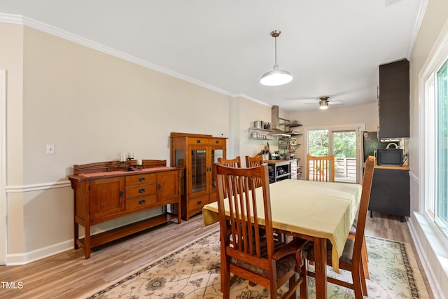 119 Danforth Dr, Cary, NC 27511 - dining space with light wood-style flooring, ornamental molding, baseboards, and ceiling fan