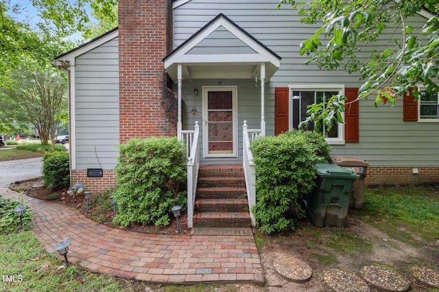 119 Danforth Dr, Cary, NC 27511 - entrance to property featuring crawl space and a chimney