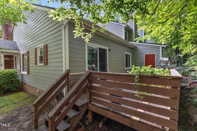119 Danforth Dr, Cary, NC 27511 - back of house featuring a chimney and stairs