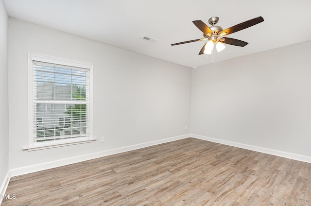 3306 Woodland Park Rd, Durham, NC 27703 - empty room featuring wood finished floors, baseboards, and a ceiling fan