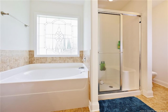 3453 Thrower Rd, Hope Mills, NC 28348 - full bath with a stall shower, a bath, toilet, and tile patterned floors