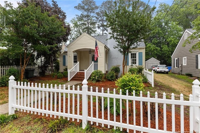 123 Ellington St, Fayetteville, NC 28305 - bungalow-style house with covered porch and a fenced front yard