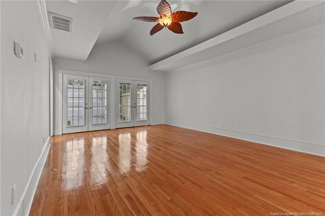 123 Ellington St, Fayetteville, NC 28305 - empty room featuring french doors, wood finished floors, ceiling fan, vaulted ceiling, and baseboards