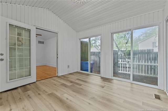 123 Ellington St, Fayetteville, NC 28305 - unfurnished room featuring vaulted ceiling, wood finished floors, and wooden walls
