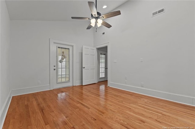 123 Ellington St, Fayetteville, NC 28305 - unfurnished room featuring baseboards, ceiling fan, light wood-style floors, and high vaulted ceiling