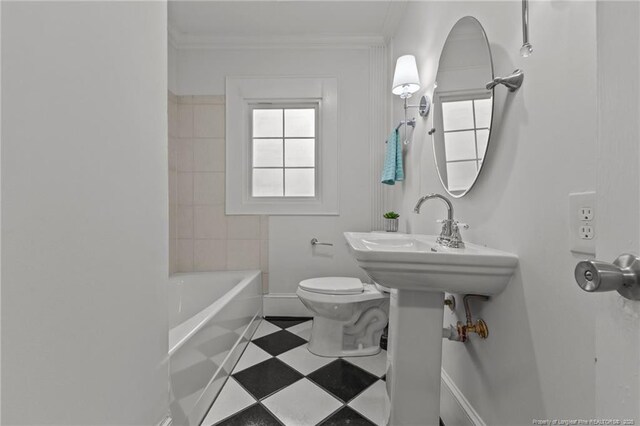 123 Ellington St, Fayetteville, NC 28305 - bathroom with toilet, baseboards, and crown molding